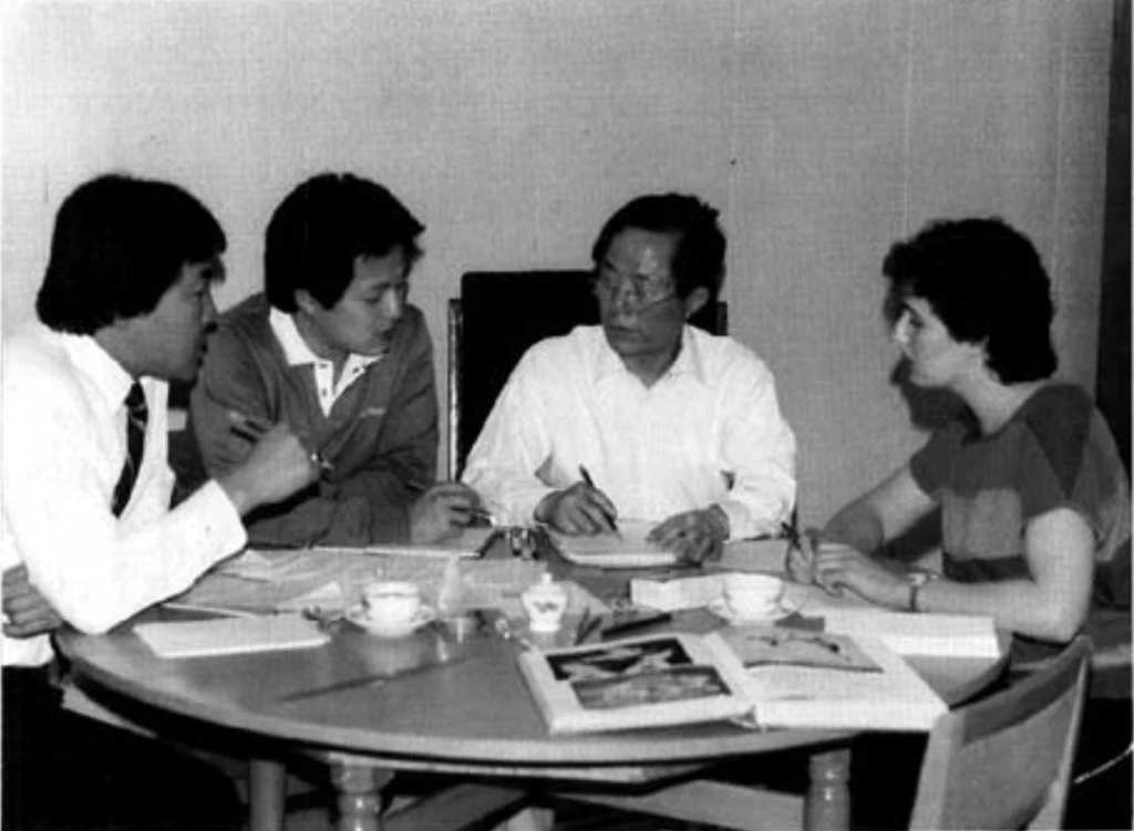 The author and the author's son Choi Joong Hwa and Master Park Jung Taek with his wife Glenda Park conduct a last minute review in the preparation of this encyclopedia.